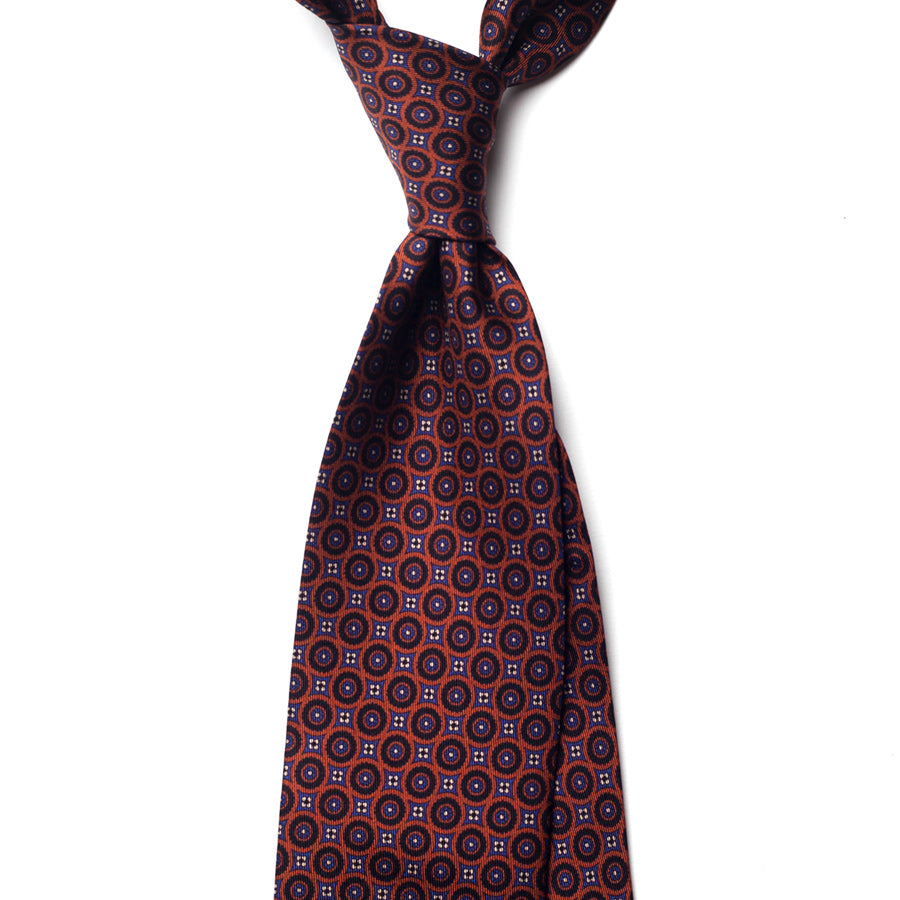 geometric silk tie – rust & navy – front view