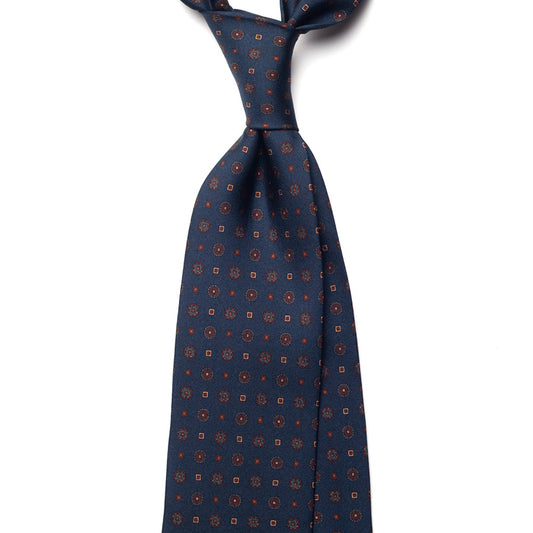medallion printed silk tie – navy & rust – front view